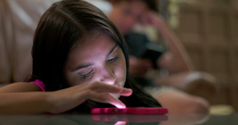 teen girl on her phone